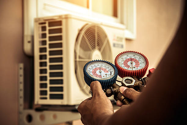 Professional Heat Pump Repair technician working in Jbsa Lackland, TX